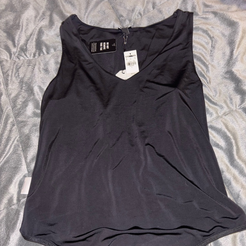 Never worn woman’s express bodysuit